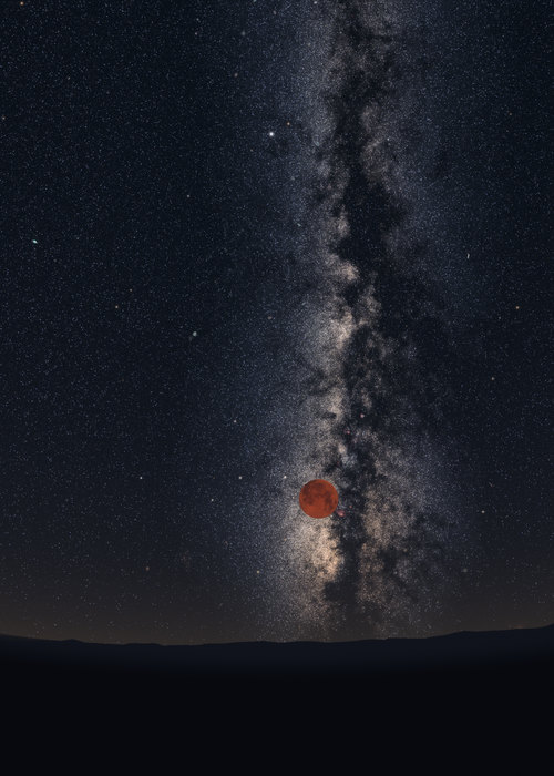 The red, eclipsed Moon low in the south-west over Lisbon before dawn, in front of the bright star clouds of the Milky Way.