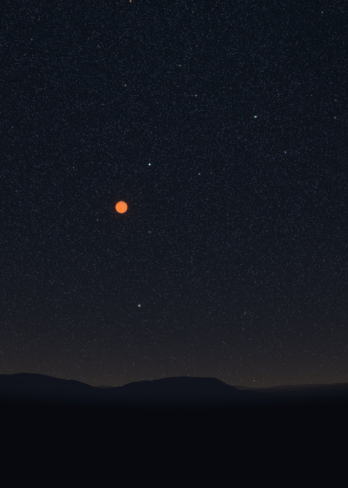Mars, bright and orange, in the south-east over Lisbon, with Fomalhaut below it.